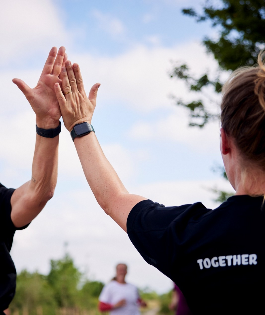 Two persons high-fiving